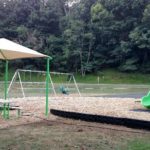Playground picnic area shade structure, inclusive play