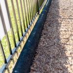 Rubber curbing for playgrounds, playground surfacing